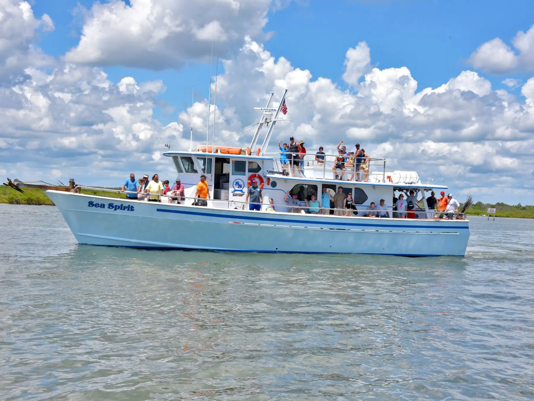 a small boat in a large body of water