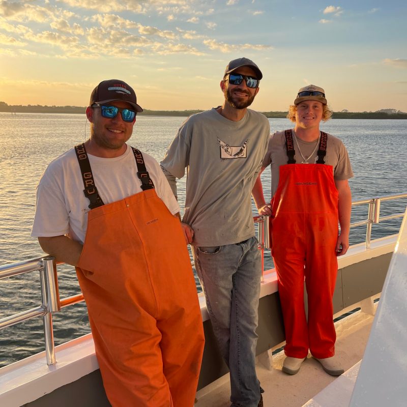 a group of people posing for the camera